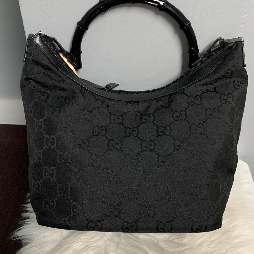 Authentic Gucci black leather and nylon jumbo GG hobo bag w bamboo handle